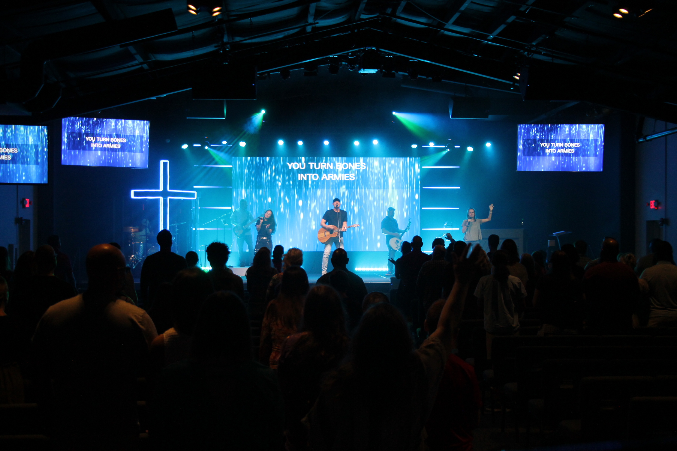 Photo of people worshiping with music at Liberty Church Guld Breeze Campus